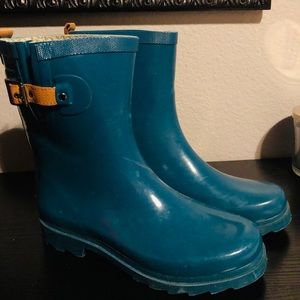 Classic teal Chooka rain boots with tan details